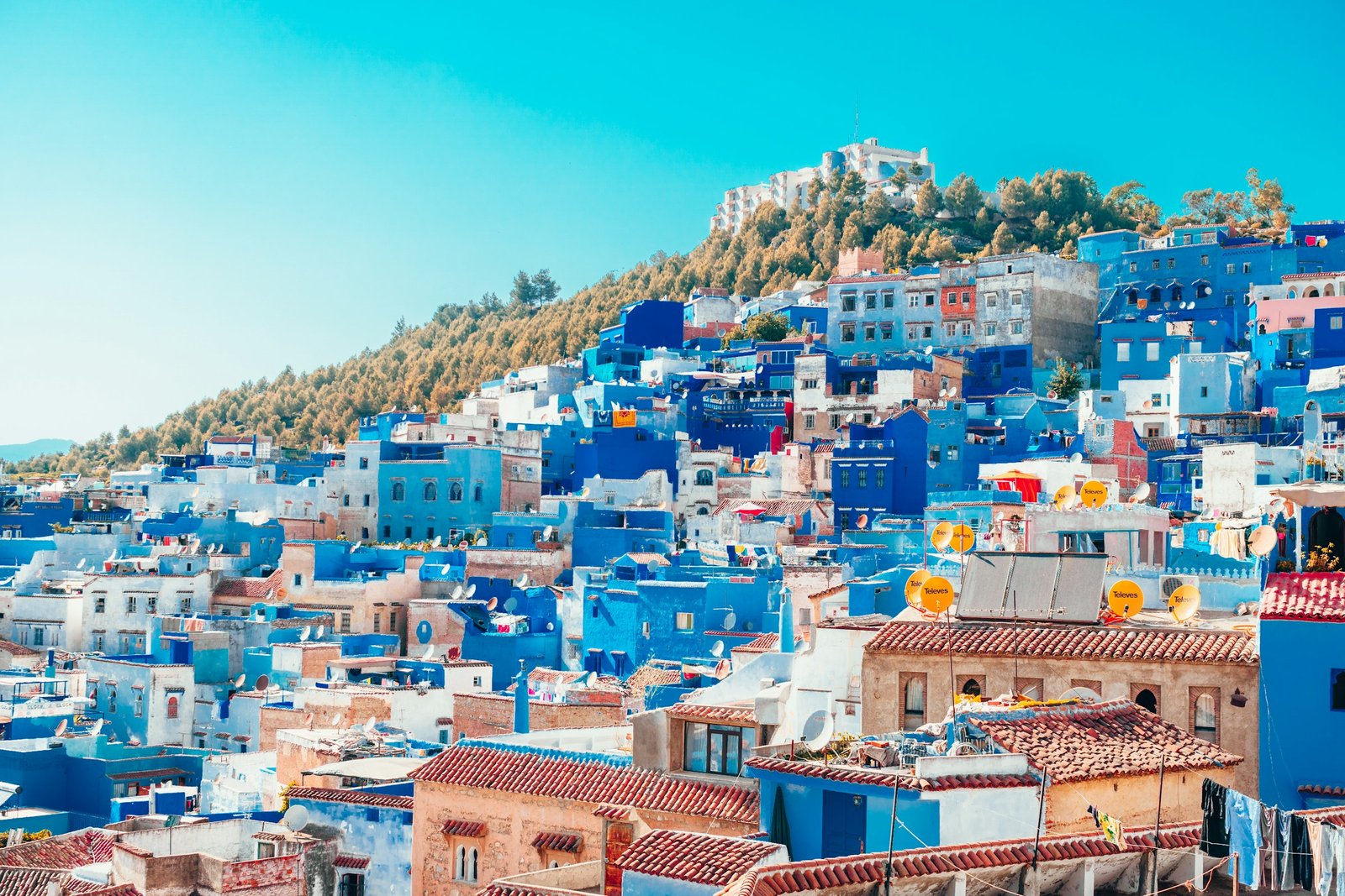 The blue-washed houses of Chefchaouen stacked up the hillside